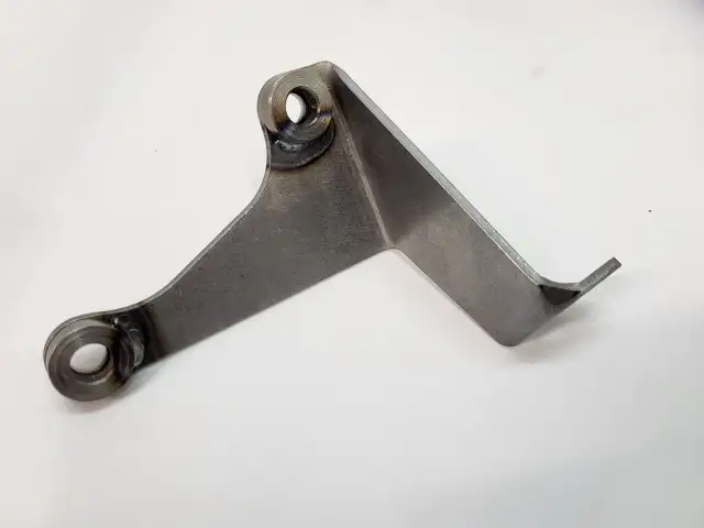 BRACKET-CABLE INTERLOCK-MOUNTS ON TRANSMISSION-TH400 AUTOMATIC-USA-UN PAINTED STEEL-69-76 (#E14724)