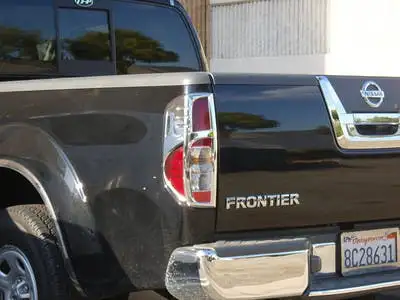 TFP 376D TailLight Insert Outer Frame Lining with Bar that Runs Split in Middle