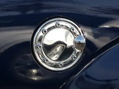TFP 807B Fuel Door Insert 1 Piece Design With Raised Bolts Stainless Steel Chromed Finish