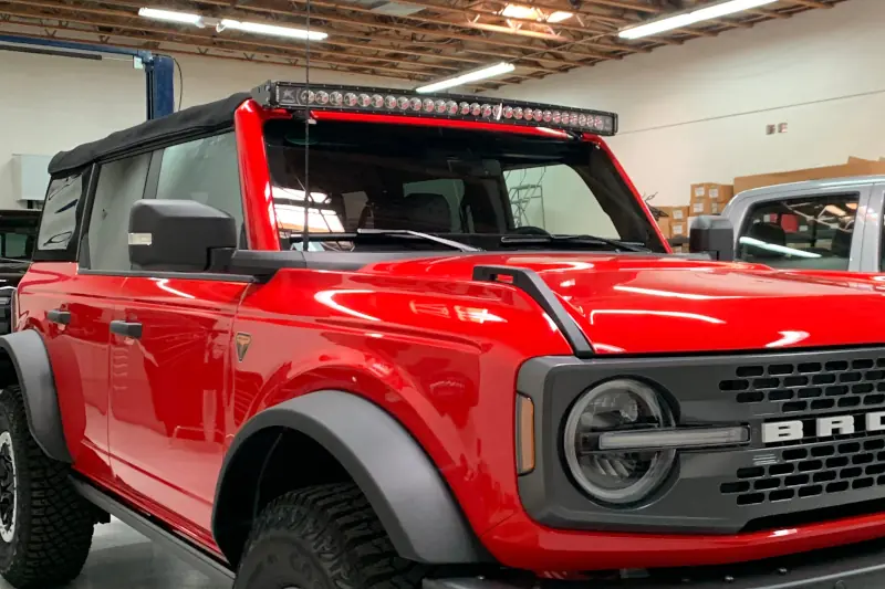 2021-2025 Ford Bronco Grimm & RIGID 50 inch Windshield Light Bar Mount Kit with RIGID 50 inch E2-Series Pro White Combo LED Light Bar | BRONCESER50ROOF